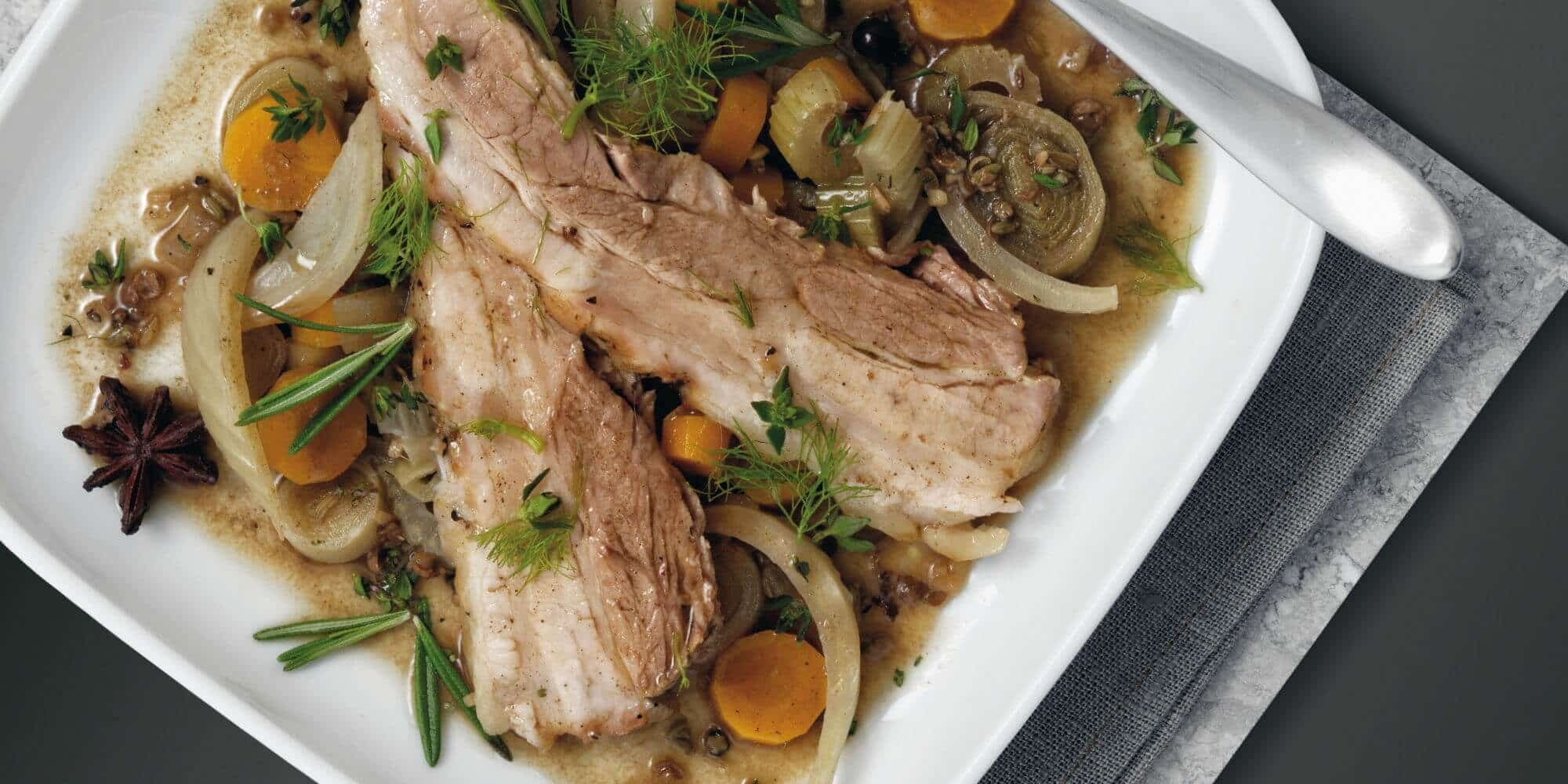 SPICED BELLY OF PORK IN A VEGETABLE AND GINGER STOCK